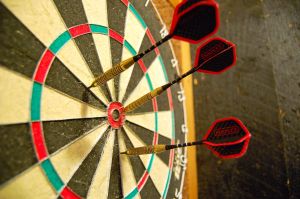 1200px-Darts_in_a_dartboard